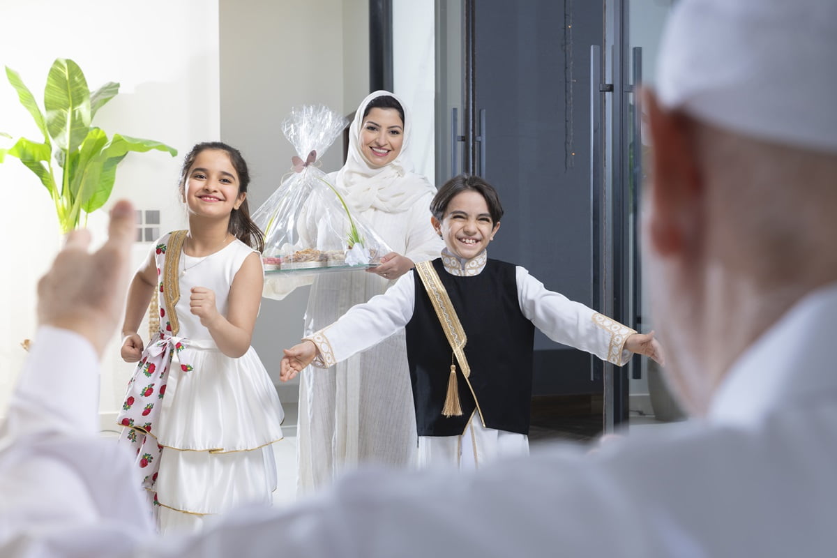 Kids greeting grandfather